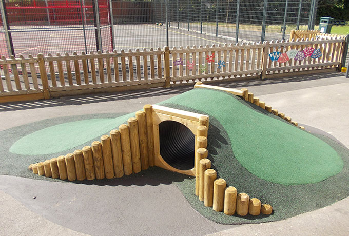 Play tunnel with safety surfacing